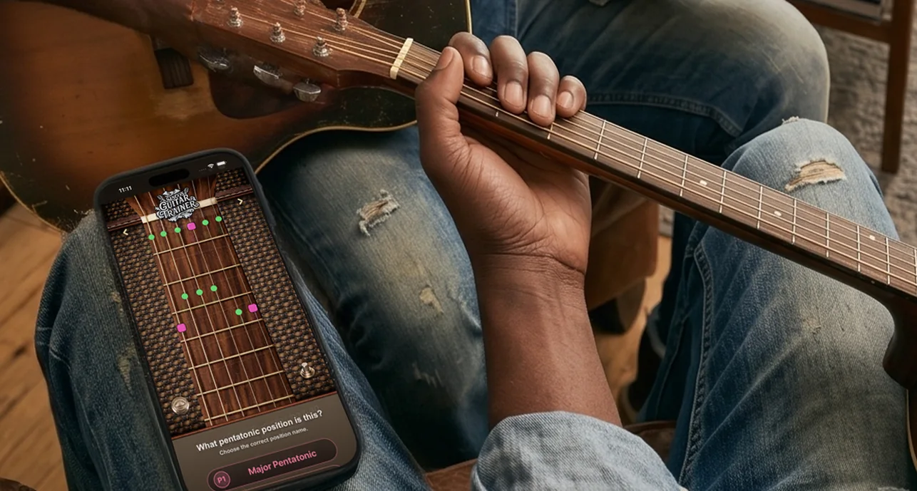 Guitar Trainer homepage artwork showing the app beside a guitarist practicing